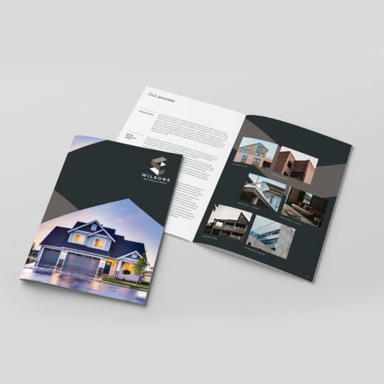 Cover and inner pages of a booklet design for a construction company