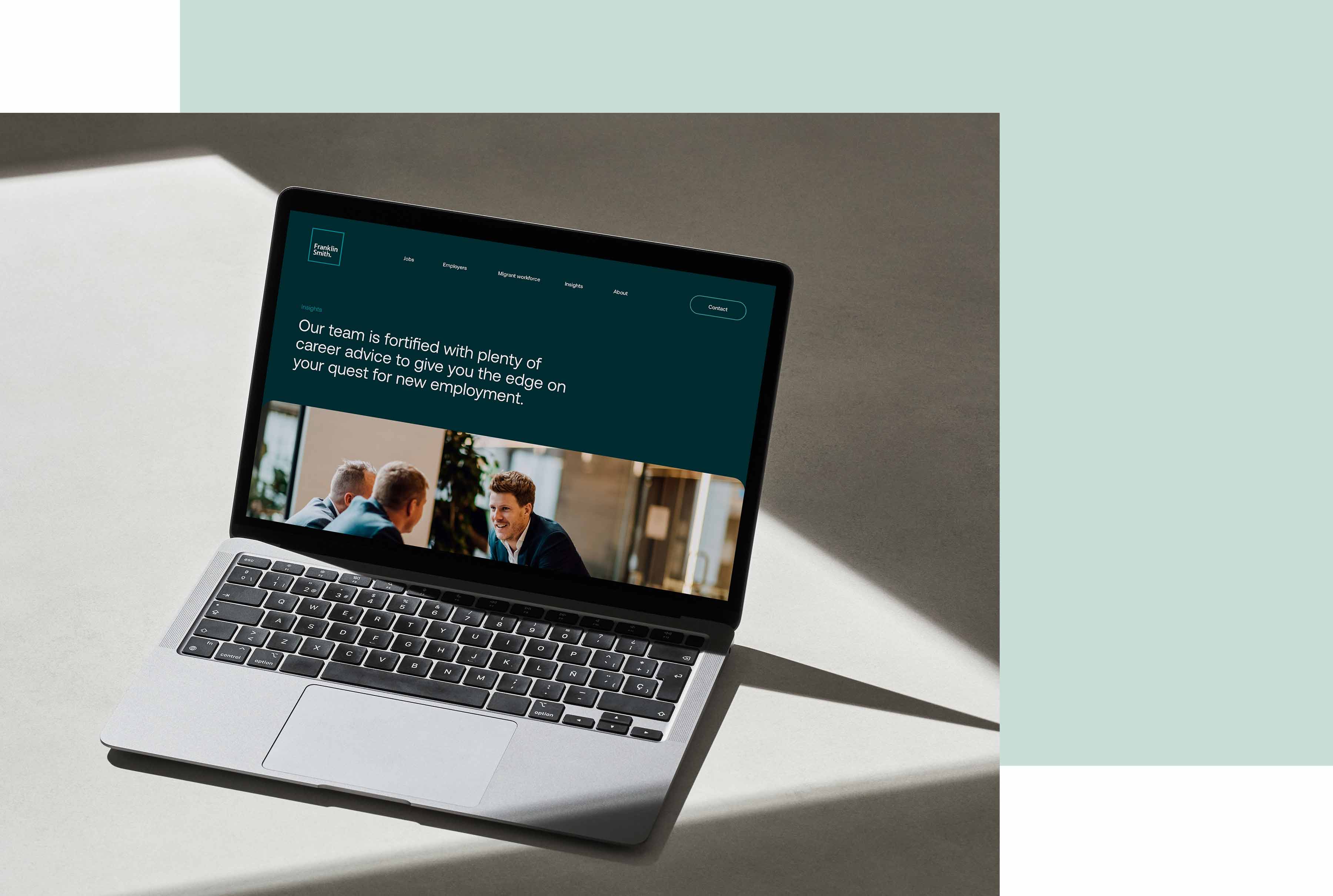 Modern website displayed on a laptop