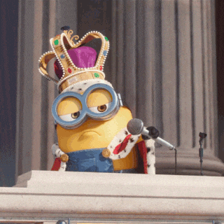 Minion wearing king costume dropping mic GIF