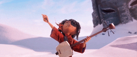 Child playing guitar with paper flying out behind them GIF by LAIKA Studios