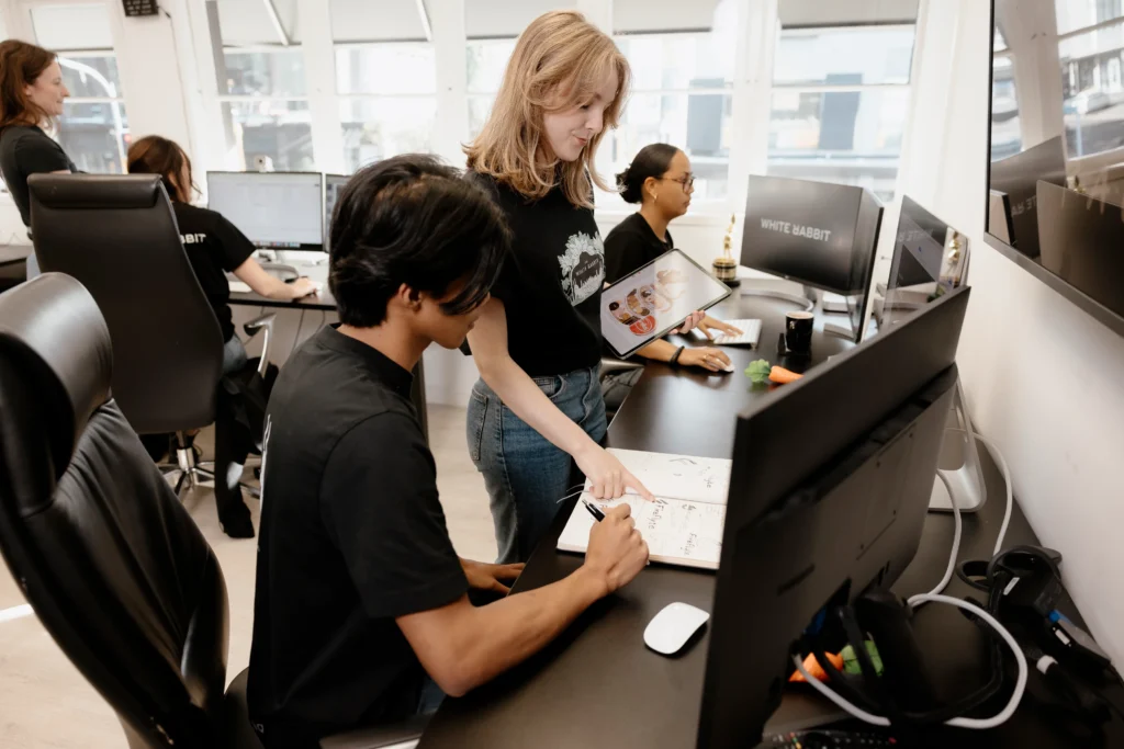 White Rabbit illustrators discussing designs for clients